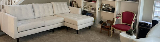 white leather mid-century modern couch